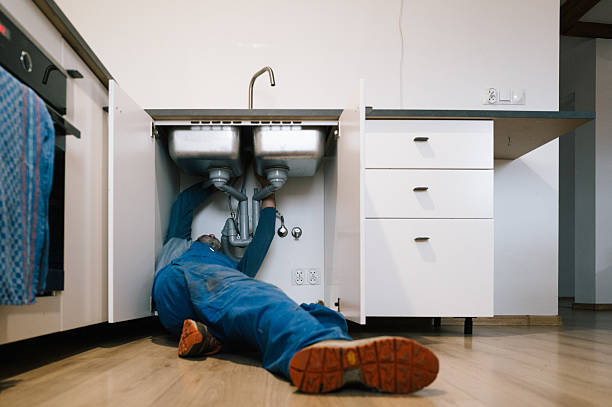 Professional Drain Cleaning technician working in Henrietta, NY